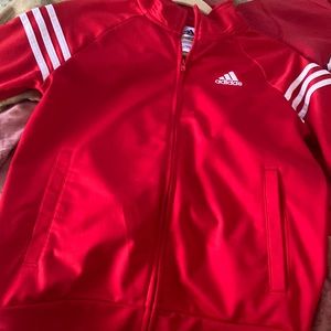 Girls adidas red jacket . size medium ..